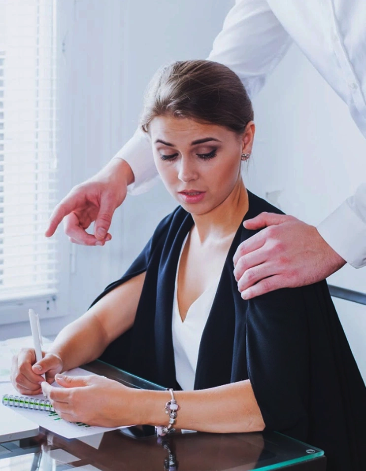 a man holding a women on her shoulder